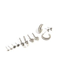 Discover antique silver gothic tooth and cross earrings featuring charm details with heart, evil eye, and sun motifs in a 6-pack front view - link has visual effect only