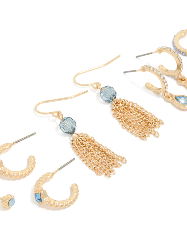 Featuring gold blue cubic zirconia studs and tassel hoop earrings 5-pack with beads, charm details in crystal close up view