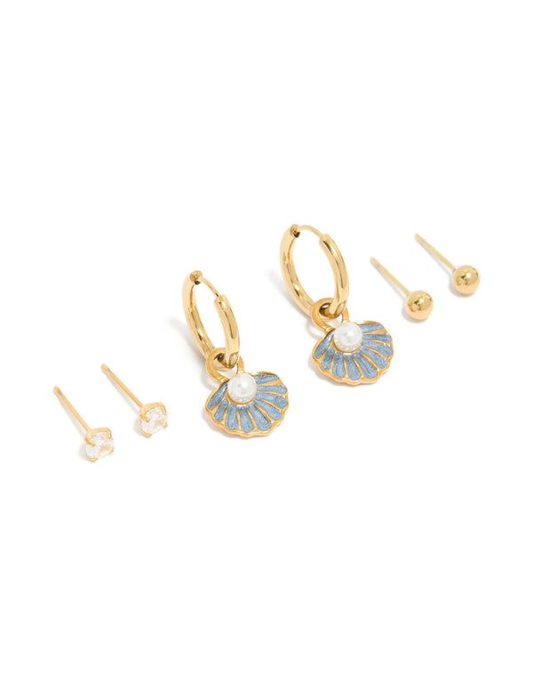 Ocean-inspired 3-pack earrings featuring shell charm hoops, clear stone studs, and ball studs in waterproof gold-plated stainless steel with white and light blue enamel accents front view