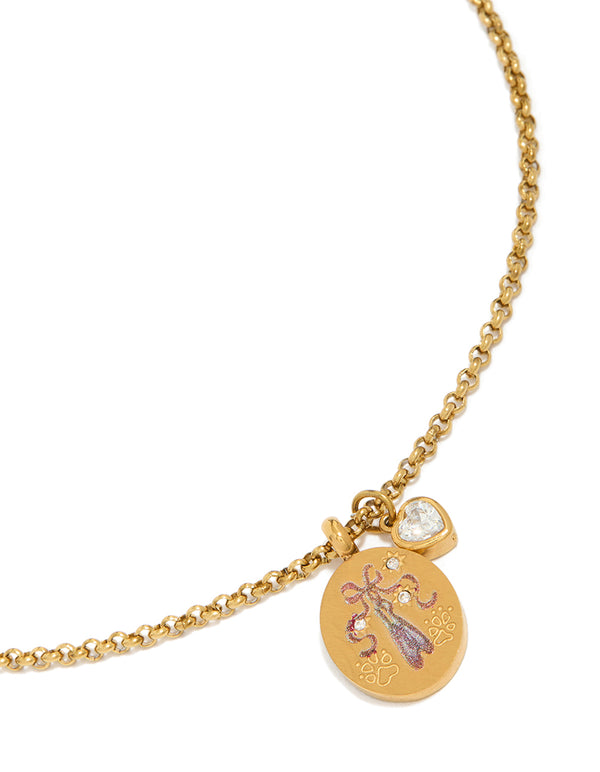 Charming gold plated stainless steel necklace featuring cubic zirconia heart charm, enamel ballet shoe disc pendant with glitter detailing, and waterproof coin elements front view