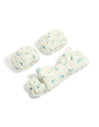 Featuring a bow and floral print in ivory, skyblue, and teal, this tweens wristband and fabric headband set front view - link has visual effect only