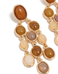 Featuring gold brown stones oval drop earrings close up view - link has visual effect only