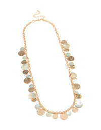 Crafted as a statement necklace with charm ocean elements featuring shell in gold front view - link has visual effect only