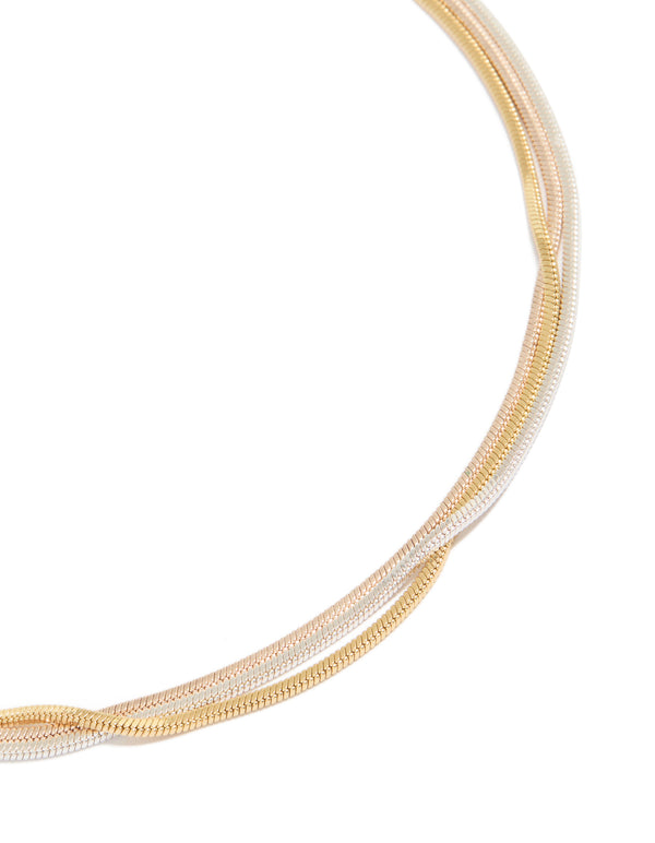 Showcasing a mixed metal thin snake chain necklace 3-pack featuring sterling silver plated, gold plated, and rose gold pendant in close up view