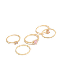Showcasing a gold plated pink heart cubic zirconia and molten rings 5-pack with crystal accents front view - link has visual effect only