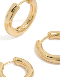 Showcasing gold plated plain thin huggie earrings in a 2-pack close up view - link has visual effect only