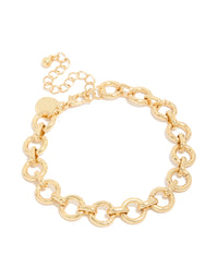 Showcasing a gold plated chunky circle link bracelet design front view - link has visual effect only