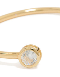 Highlighting a gold plated cubic zirconia open wrist cuff in clear close up view - link has visual effect only