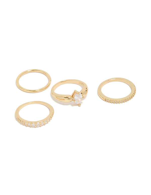 Elegant gold plated bezel set cubic zirconia band rings 4-pack featuring oval cut crystal stones front view