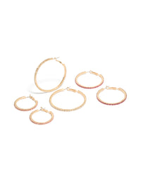 Showcasing gold clear and pink diamante mixed size hoop earrings in a 3-pack front view - link has visual effect only