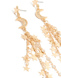 Crafted with gold star and moon chain drop earrings featuring celestial charm design close up view - link has visual effect only