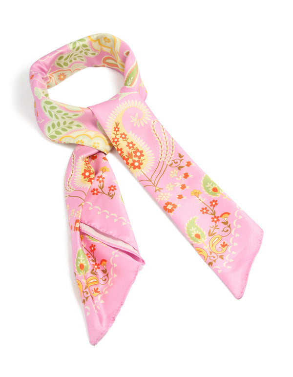 Showcasing a pink paisley floral pattern fabric scarf featuring leaf motifs in chartreuse, orange, and yellow detail view