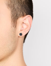 Showcasing waterproof stainless steel mens black cubic zirconia flat back stud earrings in on ear view - link has visual effect only