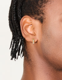 Featuring mens waterproof square cubic zirconia huggie earrings crafted from gold plated stainless steel in an on ear view - link has visual effect only