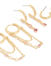Explore gold plated dark pink cubic zirconia stacker earrings 4-pack featuring crystal embellishments huggie and stud closures in hot pink and light pink close up view - link has visual effect only