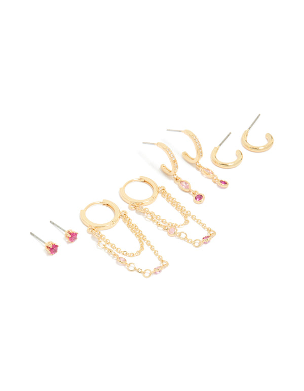 Showcasing gold plated dark pink cubic zirconia stacker earrings 4-pack featuring crystal embellishments huggie and stud closures in hot pink and light pink front view