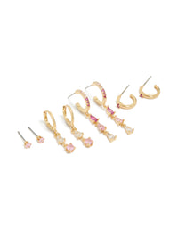 Elegant gold plated stacker earrings 4-pack featuring clear and light pink cubic zirconia crystals with huggie closures front view - link has visual effect only