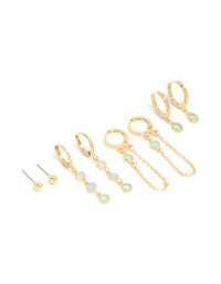 Showcasing dainty stacker earrings crafted from gold plated cubic zirconia with crystal accents in lilac and blue, featuring huggie, and stud closures as a 4-pack front view - link has visual effect only