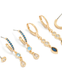 Featuring gold plated bezel dark blue cubic zirconia marquise stacking earrings in a 4-pack with stud closure close up view - link has visual effect only