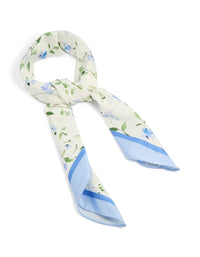 Elegant white scarf featuring blue floral print with leaf accents in sky blue light green and forest green tones side view - link has visual effect only