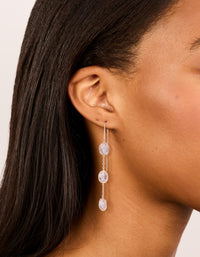 Elegant rose gold plated pink diamantes thread through earrings on ear view - link has visual effect only