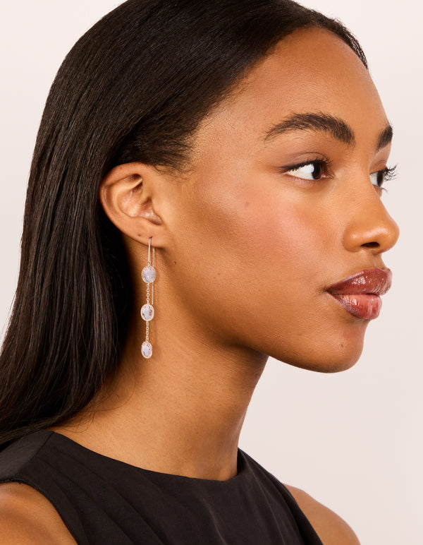 Featuring rose gold plated pink diamantes thread through earrings on model view