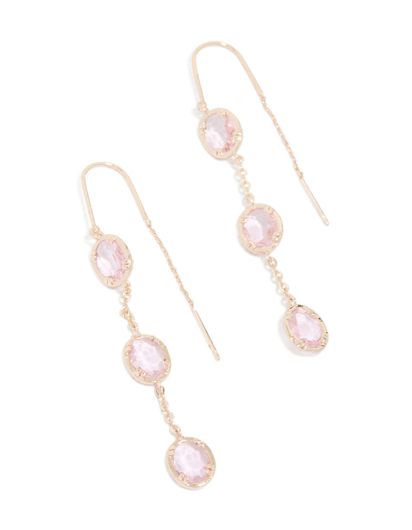 Showcasing rose gold plated pink diamantes thread through earrings front view