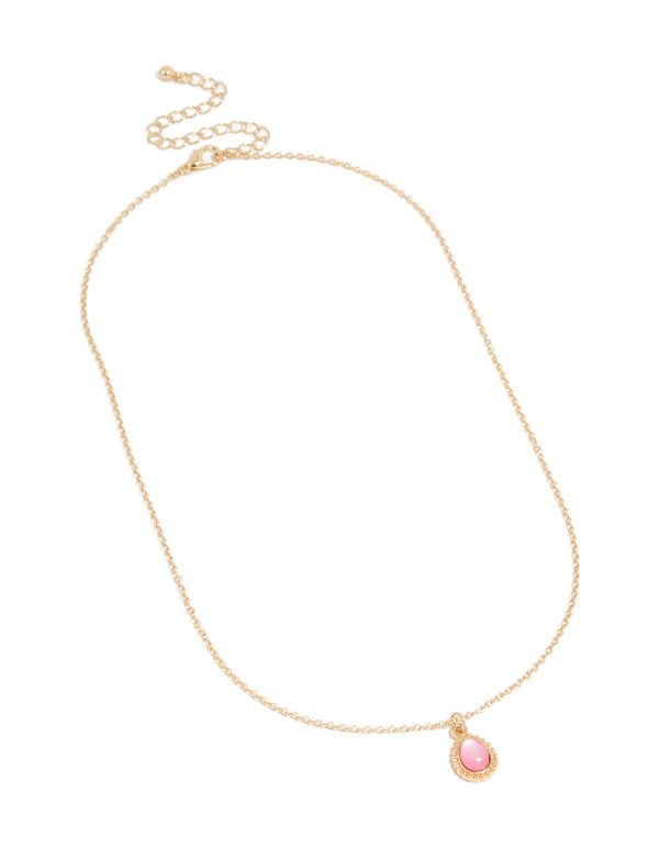 Featuring a simple teardrop pendant necklace in gold with pink front view