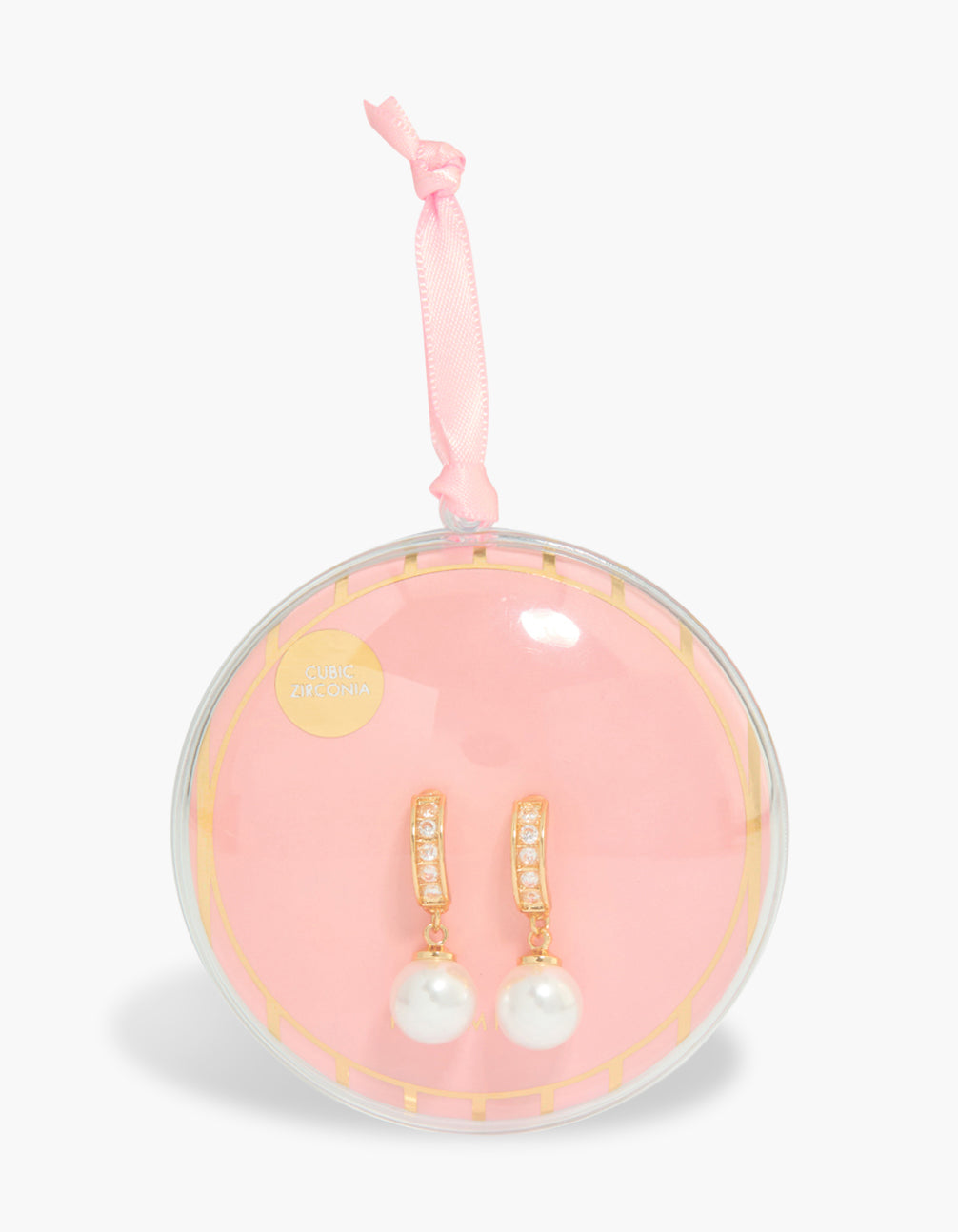 Showcasing gold plated pearl and diamante huggie earrings in a white with gift packaging front view