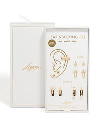 Discover gold plated cubic zirconia star chain drop earrings gift set featuring celestial designs, shown in packaging close up view - link has visual effect only