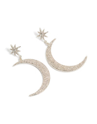 Featuring diamante celestial star and moon drop earrings in silver with statement design front view - link has visual effect only