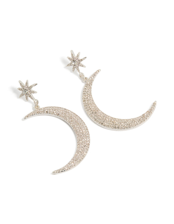Featuring diamante celestial star and moon drop earrings in silver with statement design front view