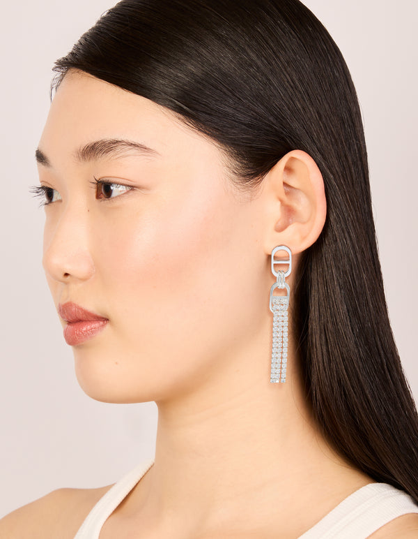 Styled silver diamante round attached tassel drop earrings on model view