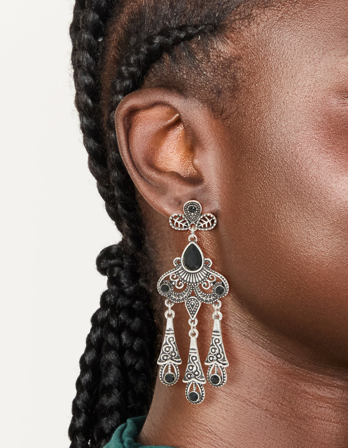 Crafted from silver and black diamante boho drop earrings in a statement style on ear view