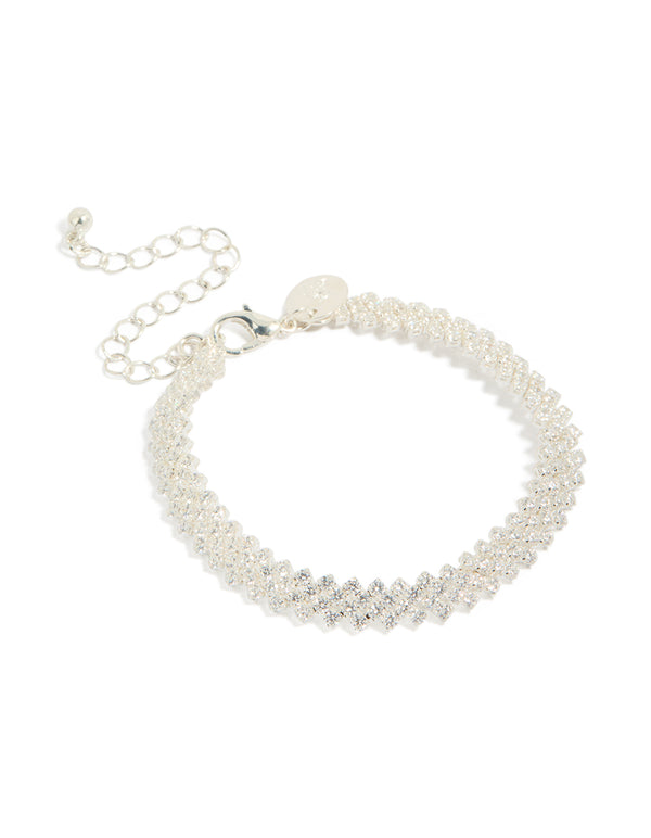 Showcasing a diagonal round cubic zirconia bracelet crafted from silver plated material front view