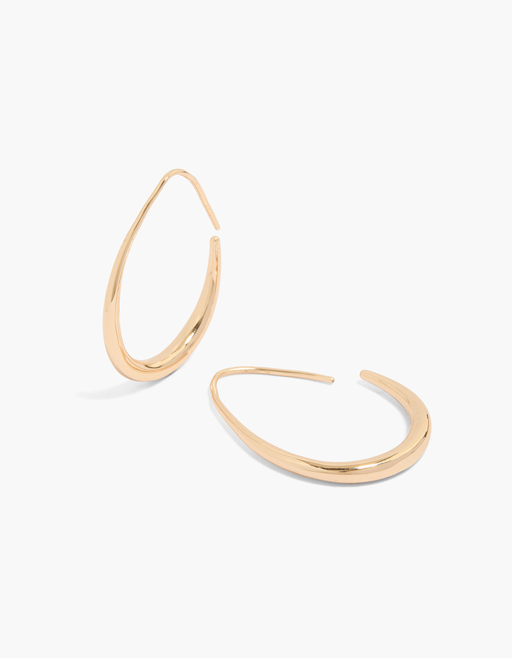 Beautifully crafted gold plain oval hoop earrings with closure front view