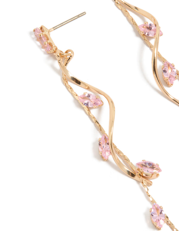 Stunning gold pink diamante swirl vine drop earrings close up view
