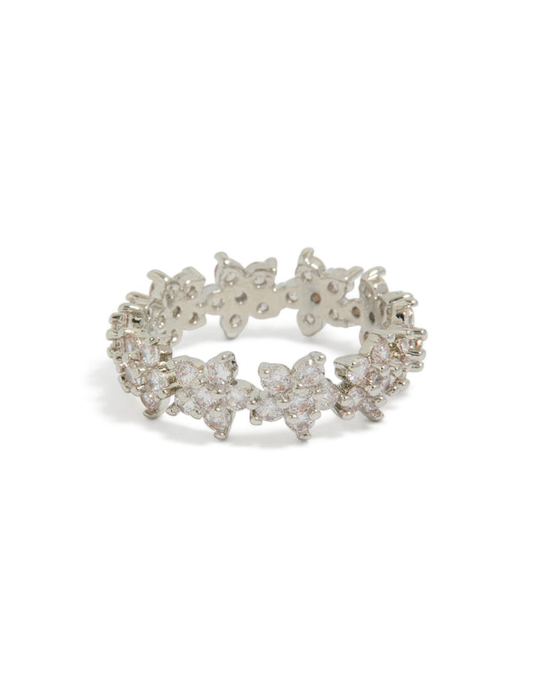 Showcasing a statement cubic zirconia flower band ring in silver and clear tones front view