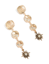 Showcasing gold triple jewel drop earrings featuring celestial star charms front view - link has visual effect only