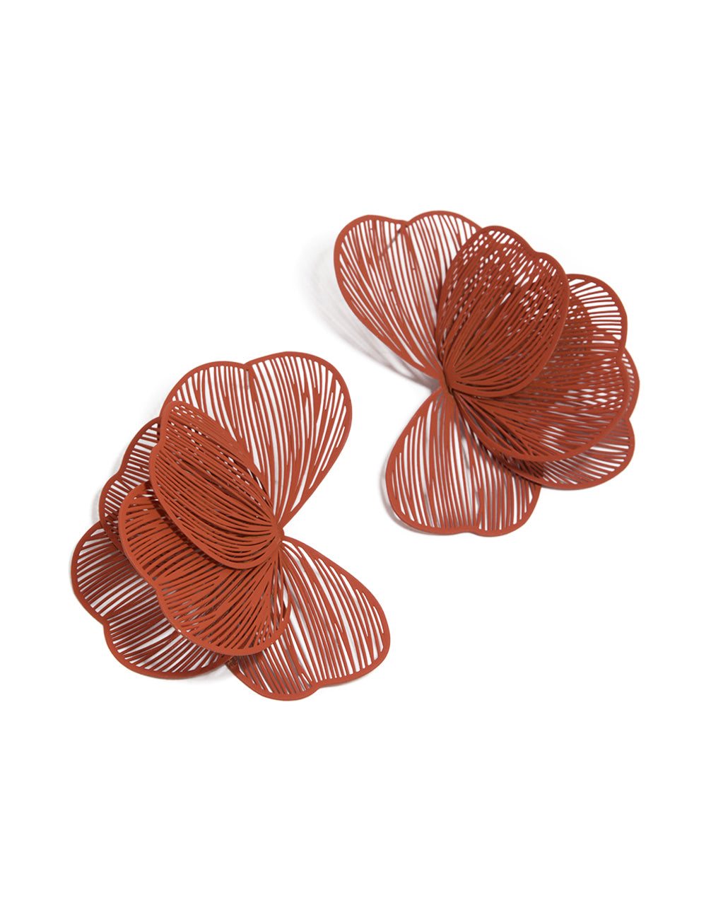 Showcasing coated wire orange petal stud earrings with floral design in sienna front view