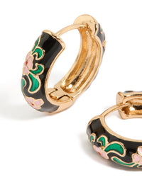Showcasing thick statement huggie earrings with floral enamel pattern in gold, black, green, and pink hoop closure close up view - link has visual effect only