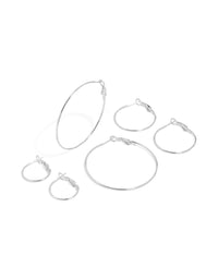 Showcasing waterproof stainless steel extra thin hoop earrings in a statement 3-pack with silver finish front view - link has visual effect only