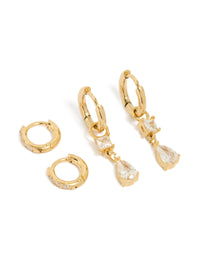 Showcasing waterproof gold plated stainless steel huggie drop earrings in a 2-pack with cubic zirconia and crystal accents front view - link has visual effect only