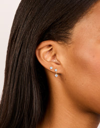 Featuring waterproof gold plated stainless steel cubic zirconia round stud and drop earrings in a 2-pack with crystal on ear view - link has visual effect only