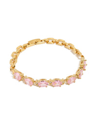 Showcasing a waterproof gold plated stainless steel bracelet with pink cubic zirconia oval stones and link design front view - link has visual effect only