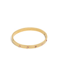 Showcasing a waterproof gold plated stainless steel hinged bracelet featuring pink diamante accents front view - link has visual effect only