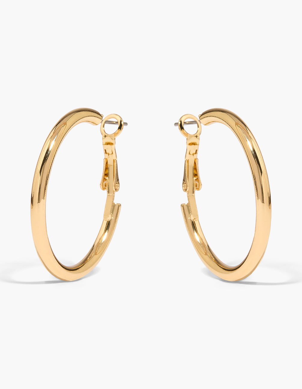 Featuring thick hoop earrings in gold plated material with a polished finish front view