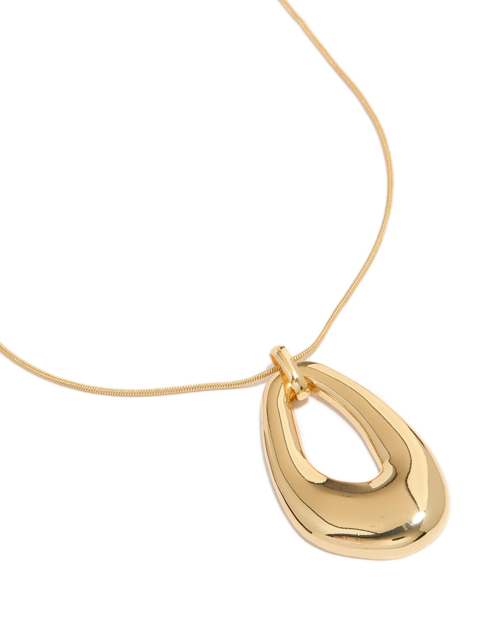 Introducing a gold plated long organic oval pendant necklace featuring an elegant design close up view