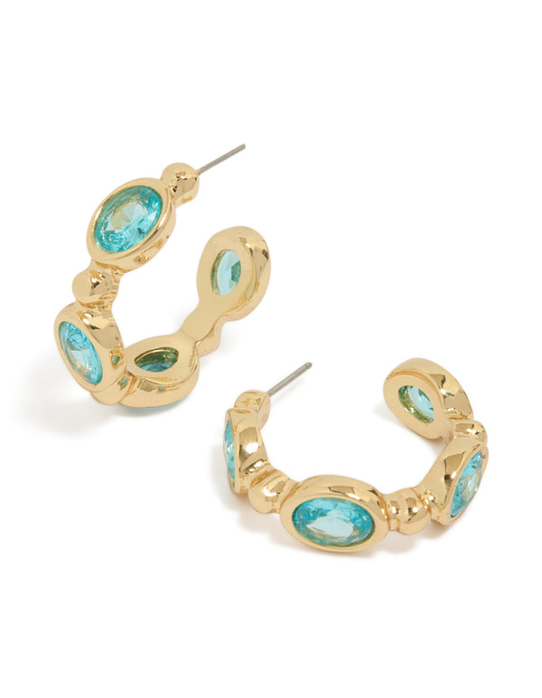 Elevate your style with gold plated cubic zirconia blue oval hoop earrings in aqua front view