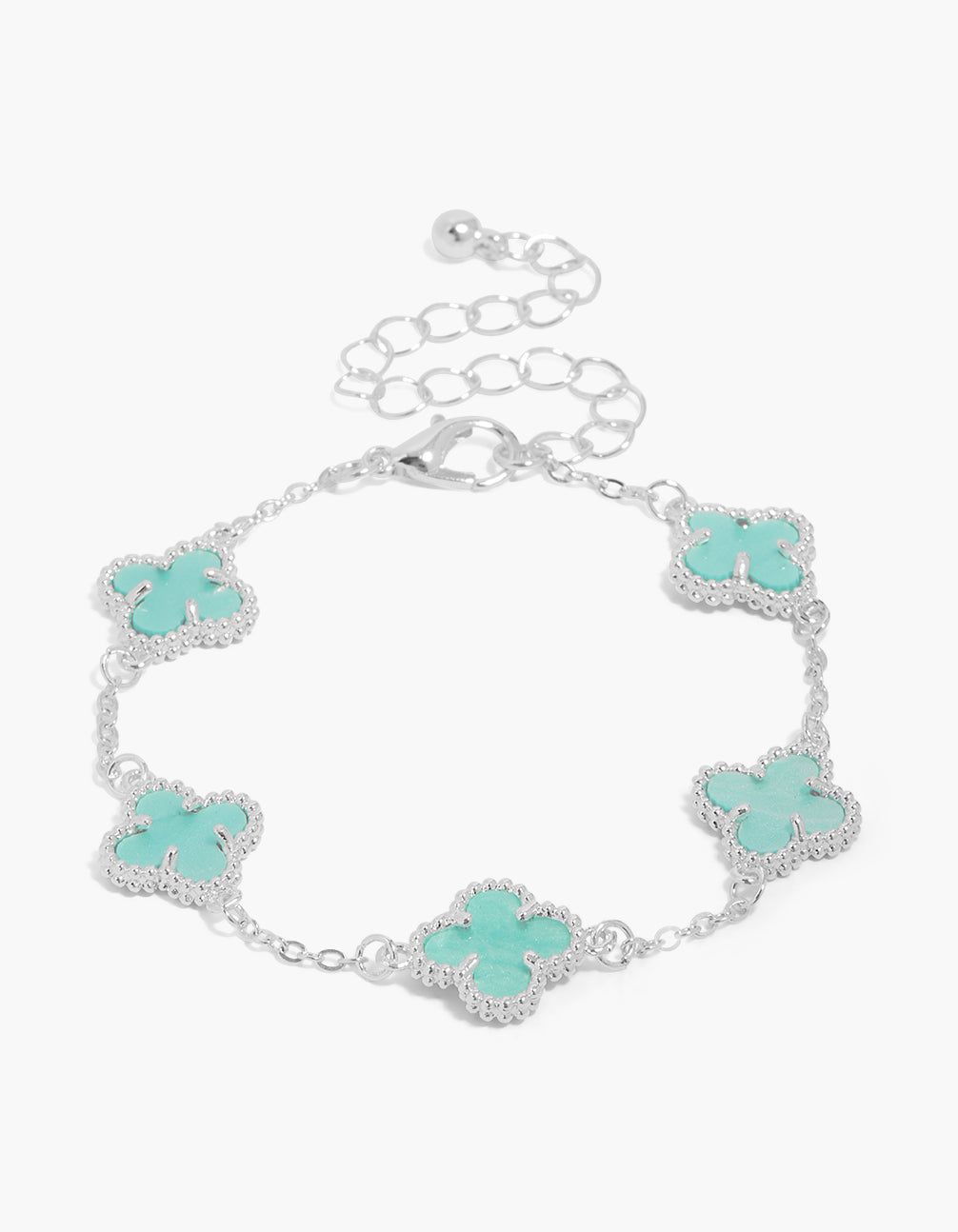 Showcasing a silver plated bracelet with turquoise floral station design featuring cubic zirconia in dainty style front view
